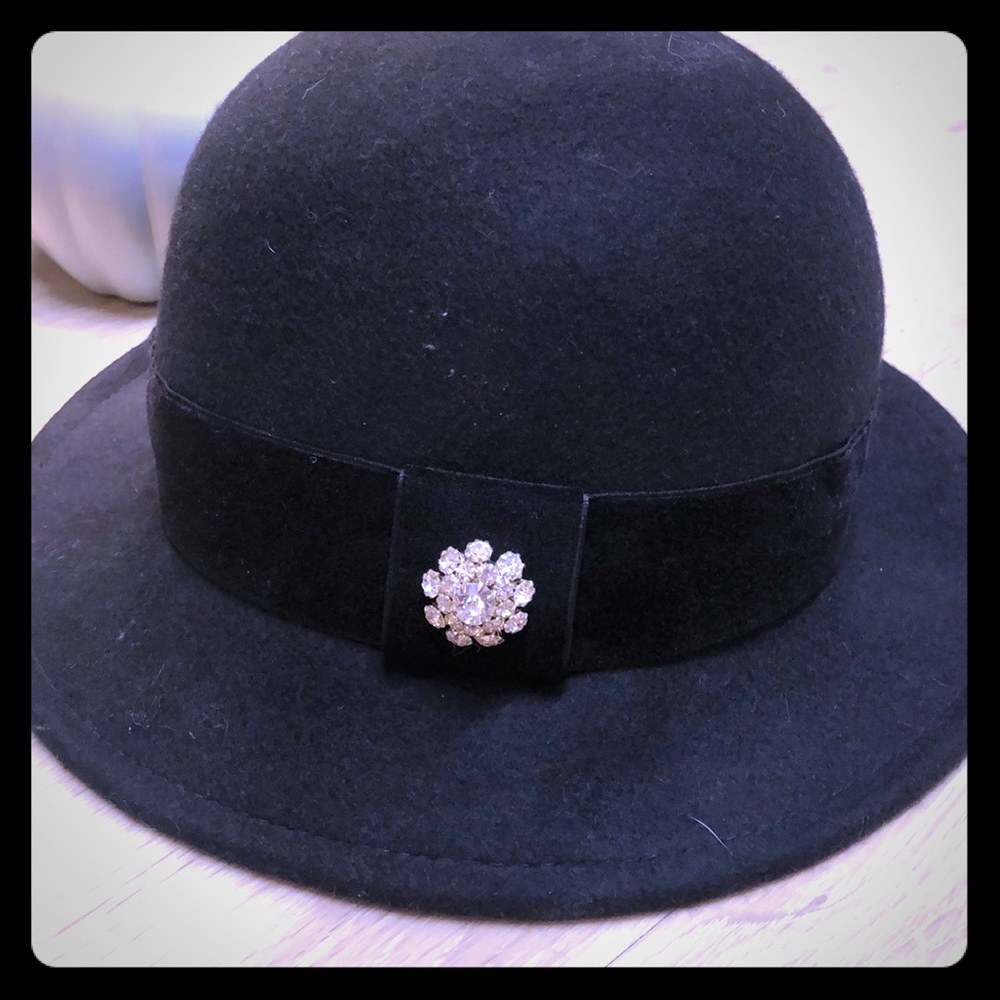 Black top hat with crystal pendant